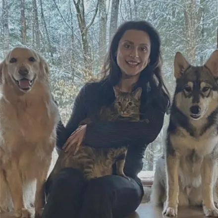 Dr. Shallen Langley with her two dogs and cat